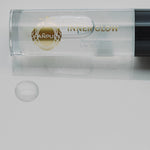 PAÑPURIのリップティントオイル〈クリア〉。ジャスミンの香りと植物由来の潤い成分で、みずみずしく透明感のある唇に導く。